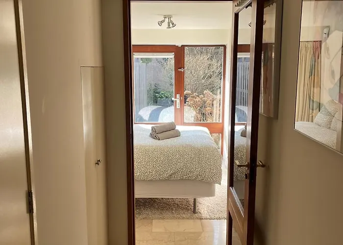 Gasthuis Cosy Garden Riverhouse